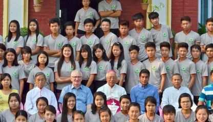 Fr. Neil Magill and Bishop Paul Grawng with HEC students in Myanmar.