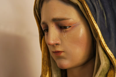 Statue of crying Madonna