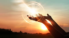 Hands raised in prayer