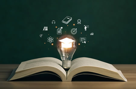 Light bult over a book in a classroom