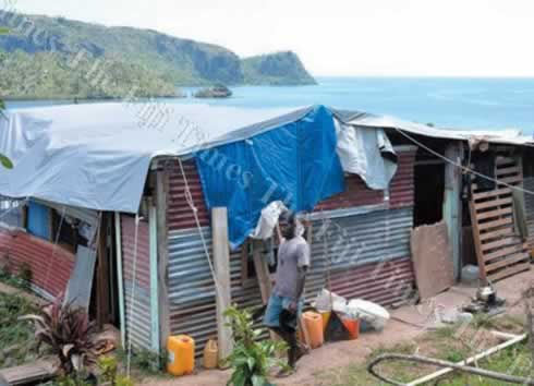 Ten months after the cyclone, families are still living in tents and scraps put together to build dwellings
