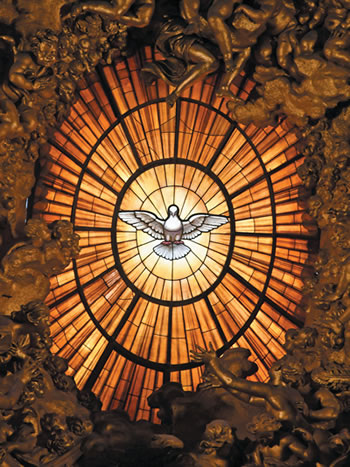 Stained glass window of a dove flying