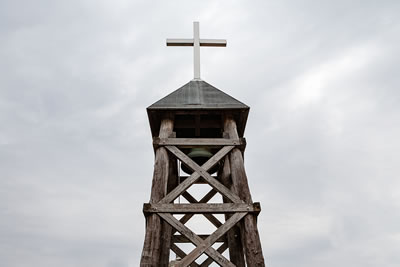 Wooden Cross atop a steeple