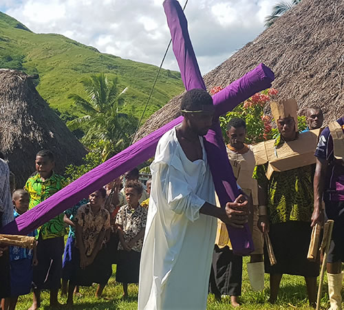 Fijian people reenact Jesus' journey to Calvary on Good Friday.
