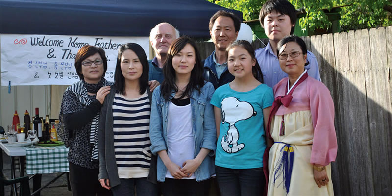 Kim Chong-hwan with his family and Columban Fr. Noel Daly on his 70th Birthday.