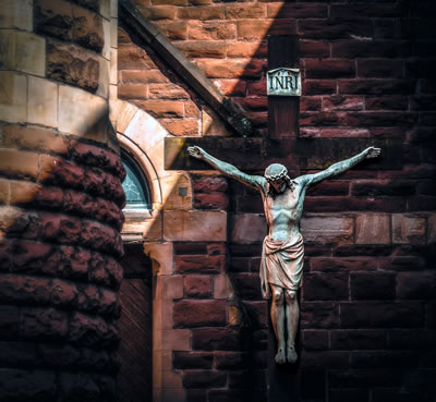 statue of Christ hanging on the cross