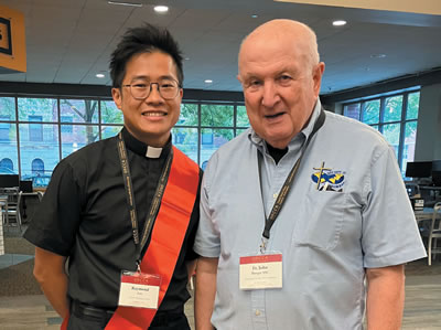 Columban Fr. John Burger (right) with Raymond Lee, a Maryknoll seminary student from Hong Kong