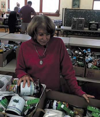 Mary Joesten at work at the food pantry