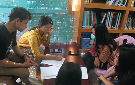 Students discussing homework.