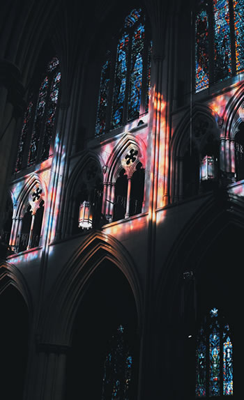 a cathedral at night.