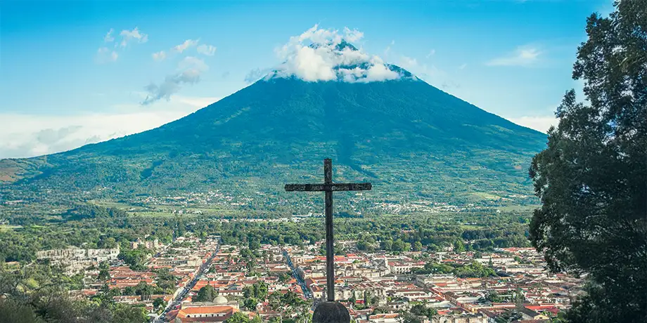 A cross overlooking the city of Livingston, Guatemala