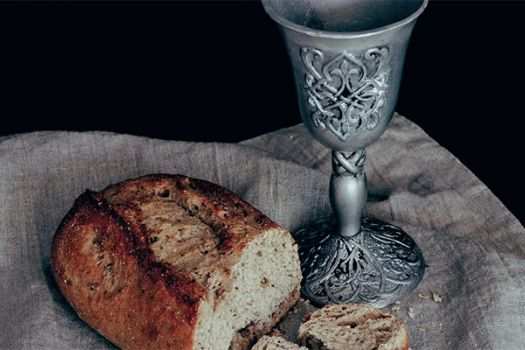 Bread and wine signifying the Body and Blood of Christ