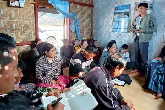 The head of the family says his prayer intentions during the church group