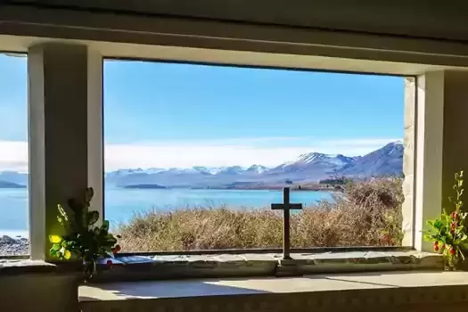 Windows overlooking a bay.