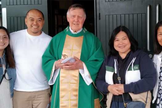 Columban lay missionary Angela Escarsa (right) with Columban Fr. Sean Coyle (center), Columban lay missionary Sherryl Lou Capili, and Sherryl’s brother and sister-in-law during a mission appeal at St. Charles Borromeo in Leixlip, Ireland