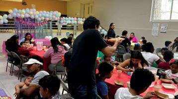 Members of the ColumbanBorder Ministry holds a cildren's birthday party at the cathedral in Ciudad Juarez, Mexico