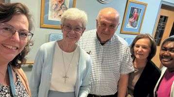 Pictured, from left, are Angela Bennett, Sister Mary Ellen, Fr. John Burger, Angie Determan, Columban lay missionary Sainiana Tamatawale.