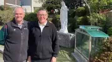 Frs. John Boles and Michael O'Grady at the "18th May Cemetary"