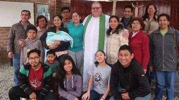 Fr. George Hogarty with the parishioners of the Sacred Heart of Jesus. 