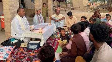Fr. Iowane Naio celebrates Mass with the Sindhi Bheels community in Pangrio Village.