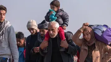 migrant family with children looking for refuge