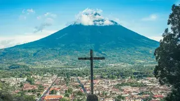 A cross overlooking the city of Livingston, Guatemala