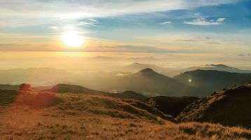 Rolling hills at sunset