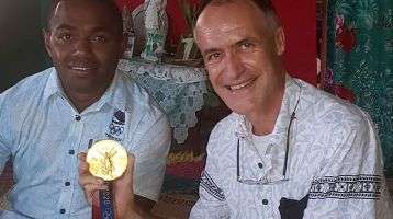 Olympian Waisea Nacugu (left) and Fr. Patrick Colgan