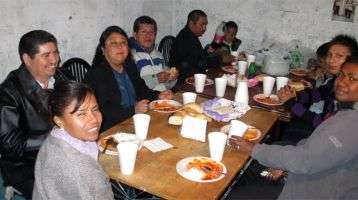 Sai with parish members