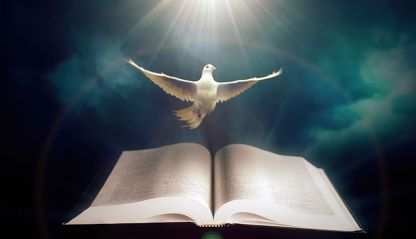 Dove over an open bible surrounded by clouds