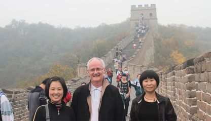 Fr. Alo Connaughton with students at the Great Wall of China
