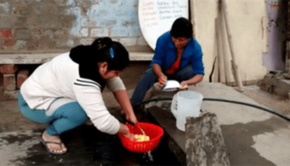 Volunteers preparing a meal at the soup kitchen.