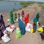 Flood victims with food