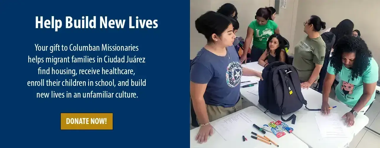 People helping register migrant children for school