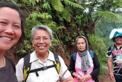 Columban missionaries Sr. Ashwena Apao (left) and Sr. Minerva Dangaran (second from left) and friends in the Philippines.