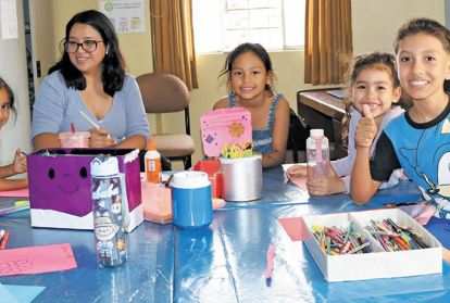 Students enjoy art class at the home.