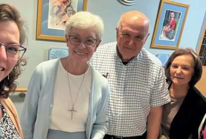 Pictured, from left, are Angela Bennett, Sister Mary Ellen, Fr. John Burger, Angie Determan, Columban lay missionary Sainiana Tamatawale.