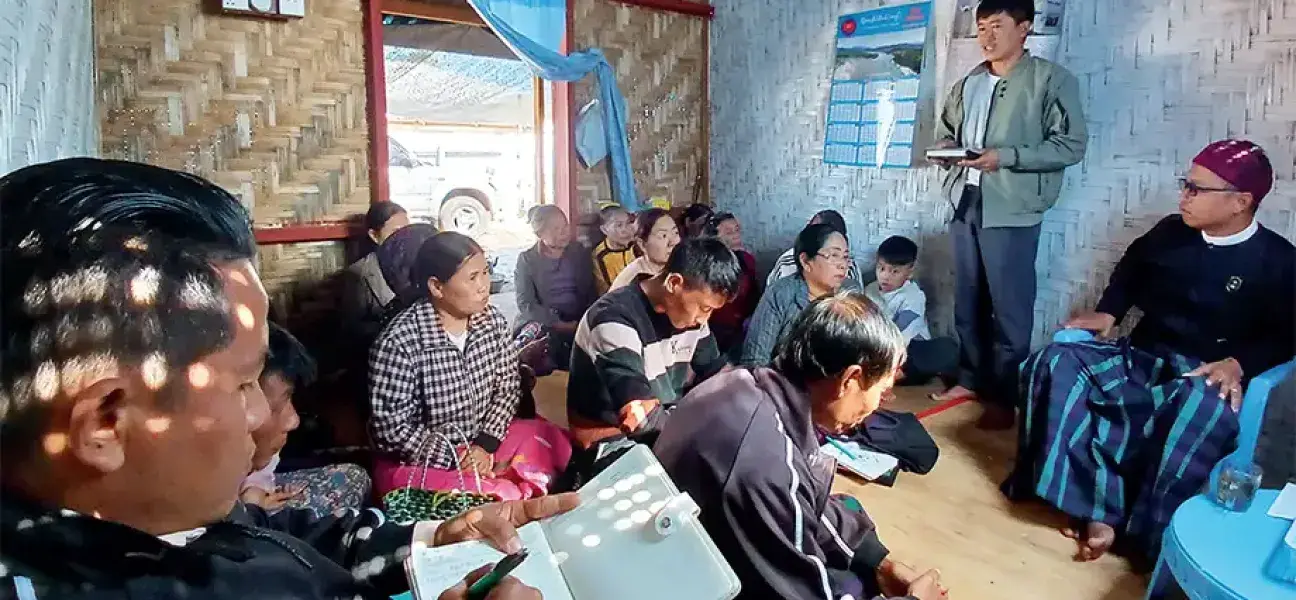 The head of the family says his prayer intentions during the church group