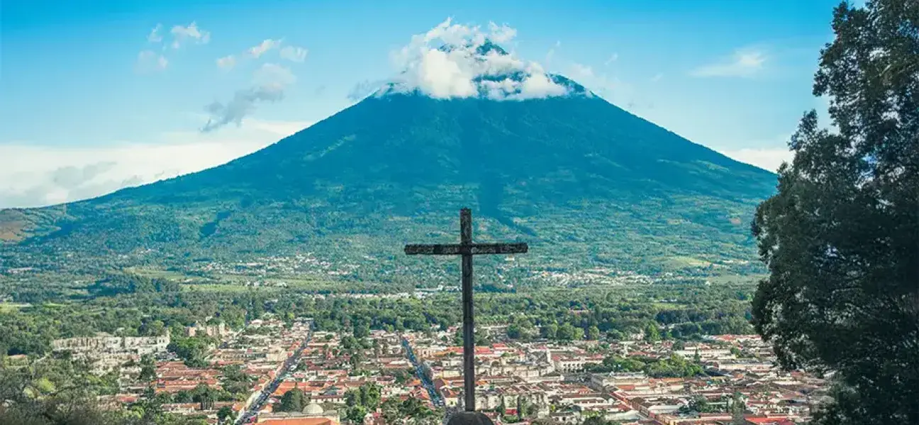 A cross overlooking the city of Livingston, Guatemala