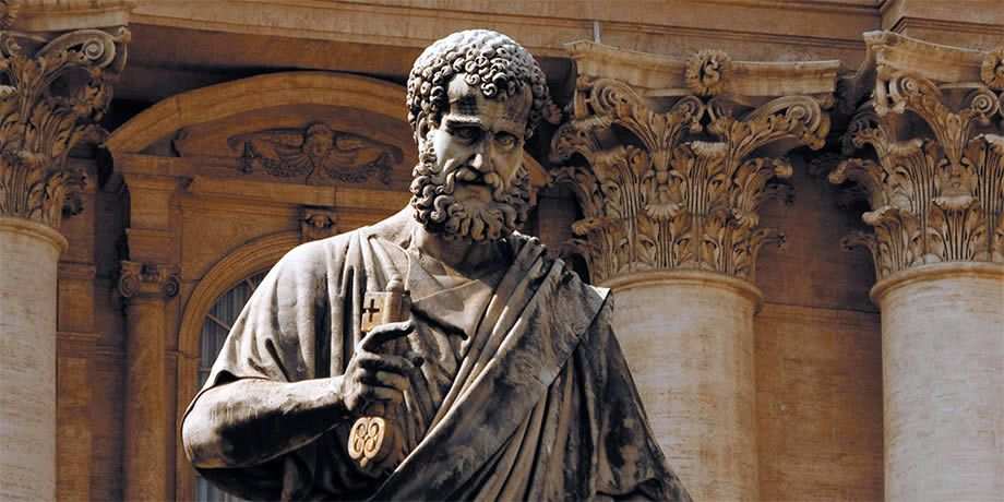 Statue of St. Peter that stands in St. Peter's Square in Vatican City, in front of St. Peter's Basilica.
