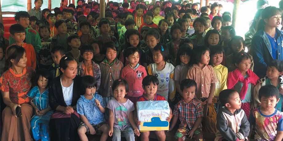 School children gather to say thank you
