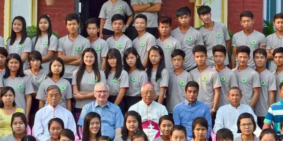 Fr. Neil Magill and Bishop Paul Grawng with HEC students in Myanmar.