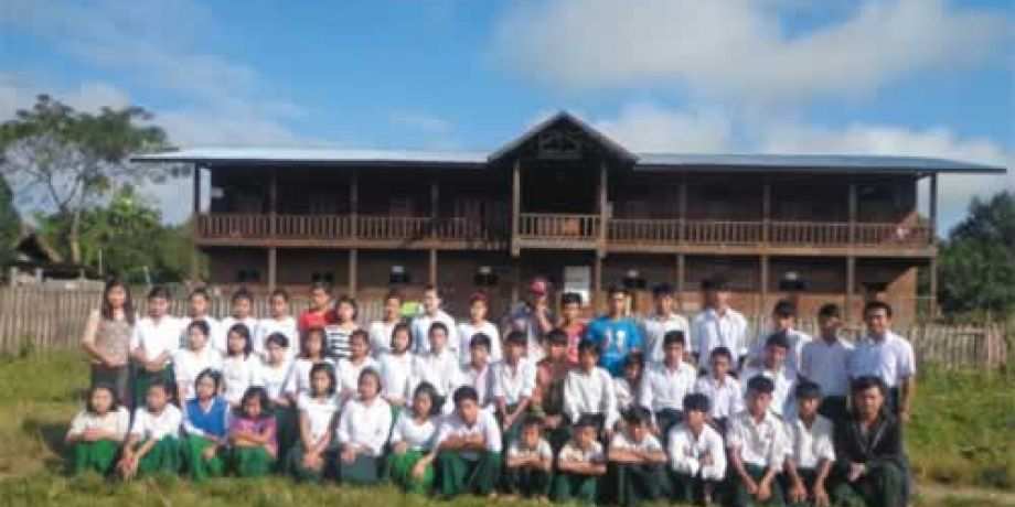Students in front of boarding house