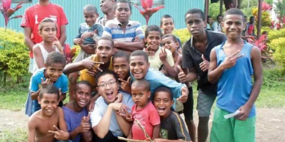 Andrew with new friends at Namosi village