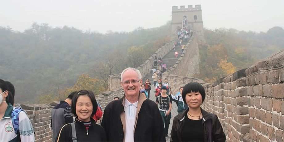 Fr. Alo Connaughton with students at the Great Wall of China