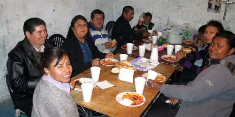 Sai with parish members