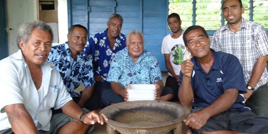 A group of Fijian men sitting around the yaqona bowl