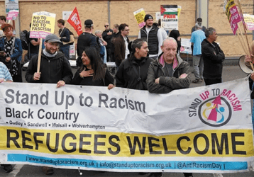 Community march to support immigrants in the UK