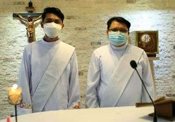 New Deacons Jerry Lohera (left) and Elbert Balbastro