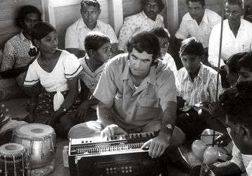 A young Fr. Frank Hoare singing with Indo-Fijian parishioners